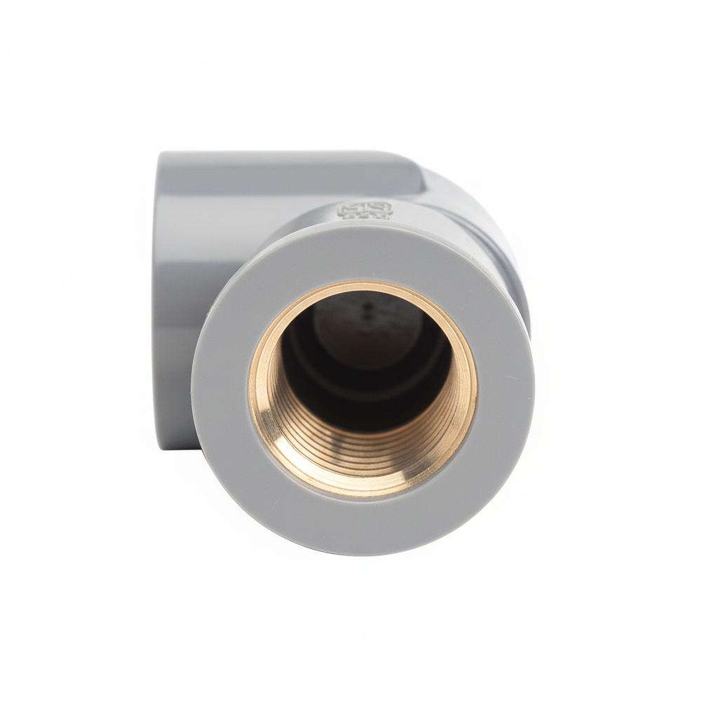 3/4" T-UK PVC Faucet Bend - Brass thread macro detail